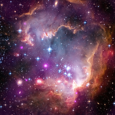 Taken Under the  Wing  of the Small Magellanic Cloud Credit: NASA, ESA, CXC and the University of Potsdam, JPL-Caltech, and STScI